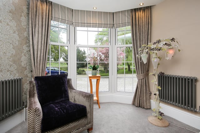 Reception rooms with bay windows benefit from natural light pouring in.