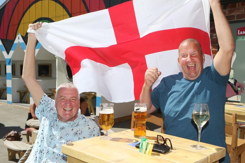 Outdoor drinkers at the Spotted Frog, in Brampton, watch England's 2-0 Euro 2020 win over Germany in June last year. Pictured are John McKaig and Dave Driffill
