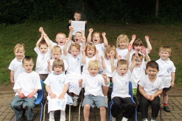Pupils at Castle View nursery school in Matlock model the England football shirts that they made themselves.