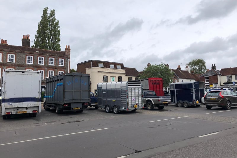In past years the car park in the centre of Wickham has seen funfair rides and food stalls set up for fair attendees. However this year, there are just a dozen horse boxes in the car park, which remains open.