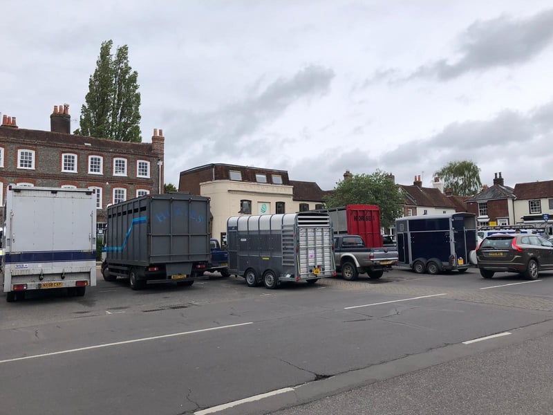 In past years the car park in the centre of Wickham has seen funfair rides and food stalls set up for fair attendees. However this year, there are just a dozen horse boxes in the car park, which remains open.