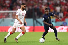 Anis Slimane in action for Tunisia at the 2022 World Cup (Photo by Elsa/Getty Images)