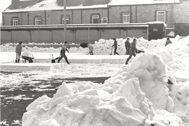Retro Buxton, clearing snow at Buxton FC ground.