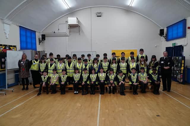 Year 5 pupils at Spire Junior School have been sworn in as mini police officers by Derbyshire police Assistant Chief Constable Michelle Shooter