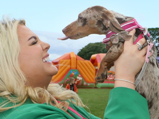 Hill is the 14th most popular name across Derbyshire, held by 3,512 people. It is a topographic name for someone who lived on or by a hill. Pictured here at an RSPCA Dog Show is Elisha Hill.
