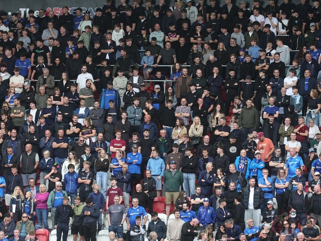 Some of the 2,285 fans who filled the away end at the New York Stadium