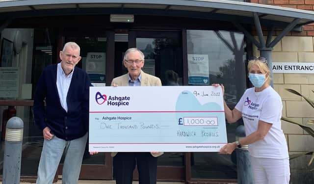 Treasurer John Young and chairman Norman White present the cheque to Lynn Jones representing Ashgate Hospice.