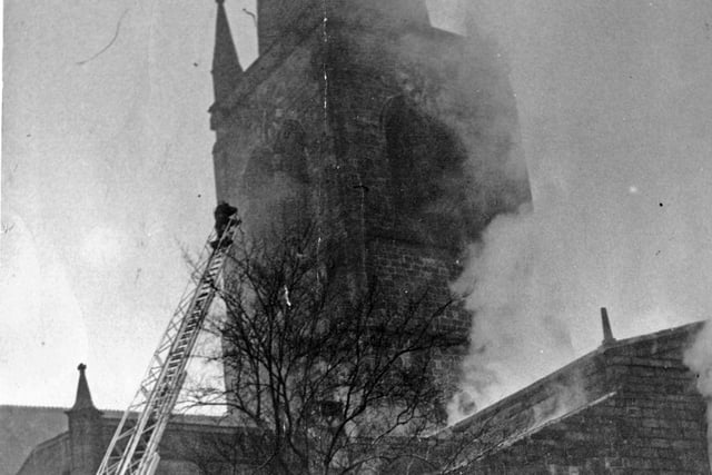 Fire takes hold of Chesterfield's famous spire in December 1961.
