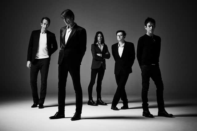 Indie royalty Suede are, from left, bass player Mat Osman, singer Brett Anderson, keyboardist/rhythm guitarist Neil Codling, guitarist Richard Oakes and drummer Simon Gilbert.