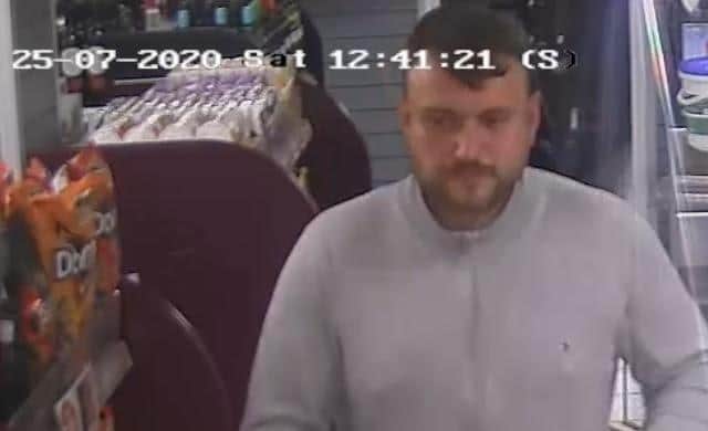 Derbyshire Police have released a CCTV image of a man they wish to speak after a woman was spat at Chesterfield.