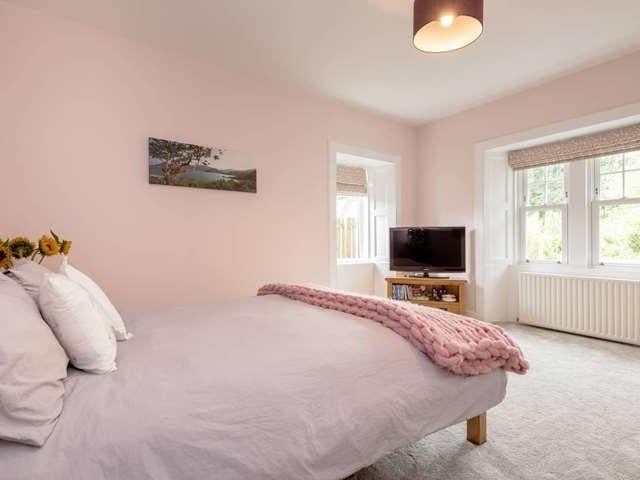 One of the four bedrooms in the home.