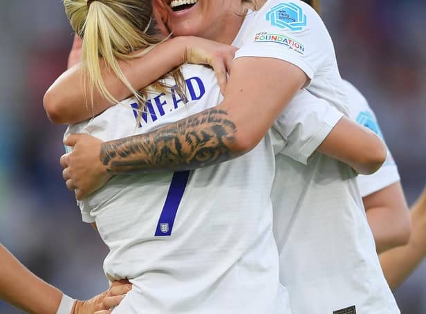 Millie Bright (right) congratulates Beth Mead after England's fourth goal against Norway on Monday night. Photo: Getty.