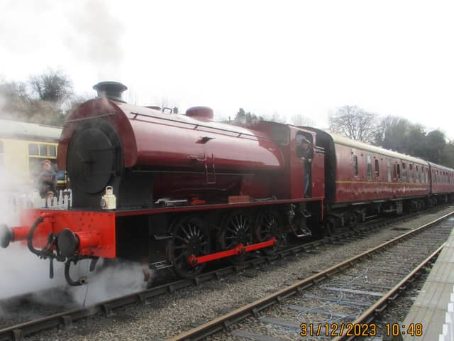 All aboard the nostalgia express: 80-Year-Old 'Austerity' locomotive steams into Ecclesbourne Valley Railway.