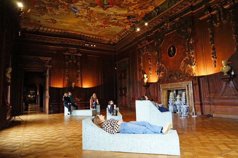 Seating enables visitors to appreciate the painted ceiling from a different perspective.