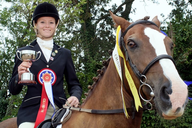 Helen Spalton,15, of Stoney Middleton and her horse Honey Duke with the trophy they won in the  national Intermediate Eventing Championships in Nottinghamshire.