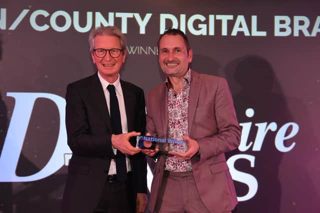 David Montgomery presents Derbyshire Times editor Phil Bramley with the award