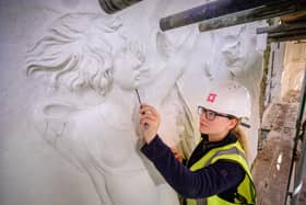 A conservator works on remarkable 400-year-old plaster friezes at Hardwick Old Hall (photo: Jim Holden/English Heritage).