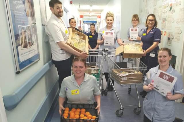 Chesterfield Royal Hospital staff receive meals from the Tickled Trout.