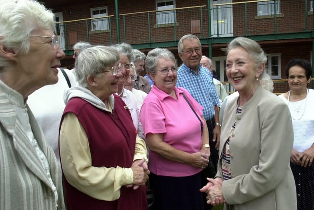 Coronation Street's Thelma Barlow chats with residents and friends at Stirling Court retirement apartments, in Chesterfield on 27 June 2003.