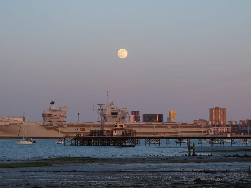 Portsmouth Super Pink Moon: Here it is captured over HMS Prince of Wales by Alison Treacher