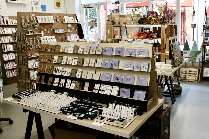 Natalie: “A lot of people say it’s like Etsy in a shop. It’s things you won’t see pretty much anywhere else. It’s all independent makers. If you can’t find a gift you will find it in here. Jewellery, cards, signs, prints, badges… socks are popular. We are taking part of the ‘Independent Chesterfield Christmas Music Trail’. So every shop that’s taking part, in their window they’ve got a display that is a Christmas song. And you can walk around with the list and find what they are and enter the competition.”
Hamper prize: wooden baubles.