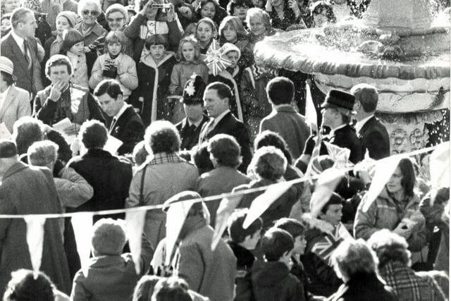 Prince Charles waling through the crowd and meeting people on his visit to Chesterfield, November 1981.