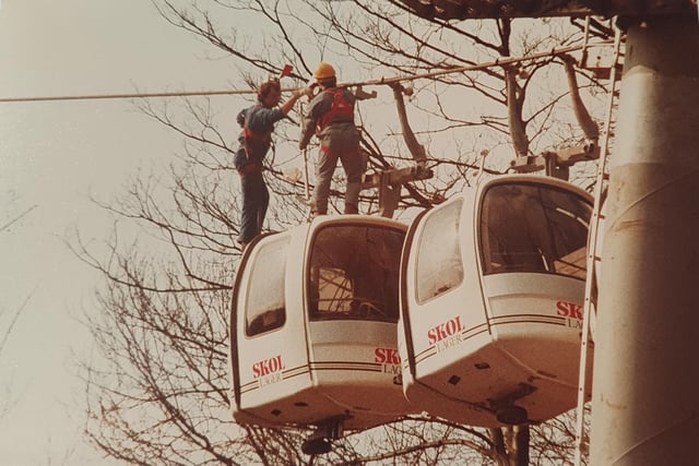 Workmen getting the cable car system ready for operation in 1984.