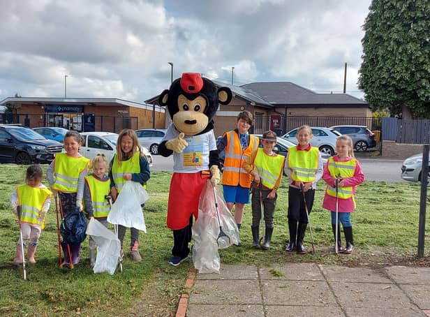The children from Ladywood Primary School pictured with the Ben's Den mascot during their sponsored litter pick