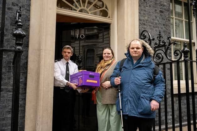Anna Tesdale joins Sense Campaigner Steven Morris to hand in petition at 10 Downing Street