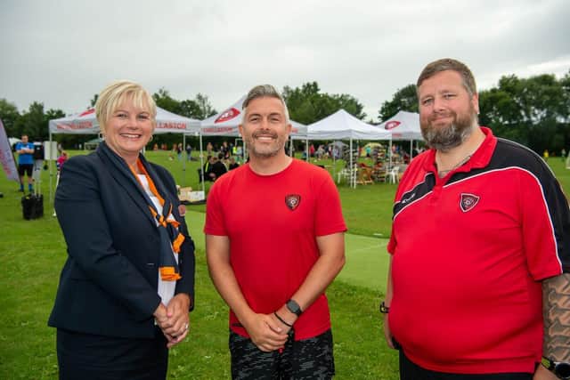 Debbie Newey, Bellway Sales Advisor, with Craig Price and Rob Cooke from AFC Chellaston