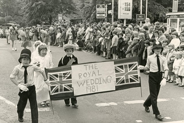 Buxton carnival celebrates the wedding of Prince Charles and Lady Di. Check out the price of fuel on sale at Kennings in the background too!