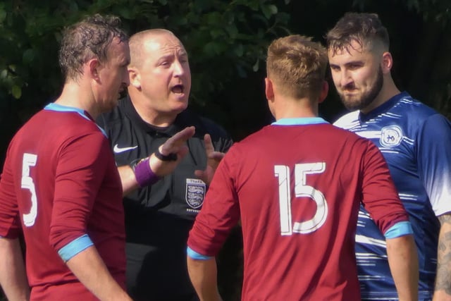 The ref lays down the law in the Brampton Moor Rovers v Britannia Tupton game.