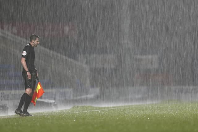 The second-half was played in torrential rain.