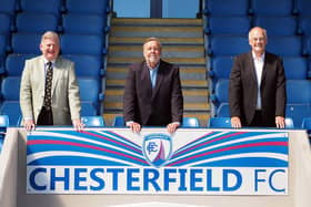 Chairman Mike Goodwin, centre, says the Spireites would like to build a new training facility.
