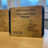 Receiving an ESFA award designed and created by Anthony Gell School Students