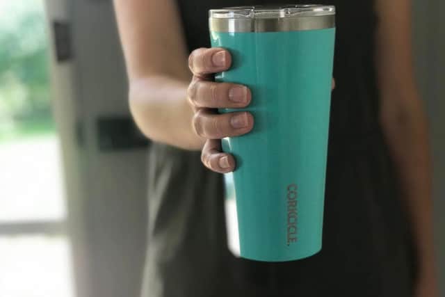 Invest in a reusable drinks cup which can be filled at home or most local cafes will now allow you to use your own cup/bottle. Some of the bigger high street coffee outlets offer a discount if you use your own cup, so it will soon pay for itself.