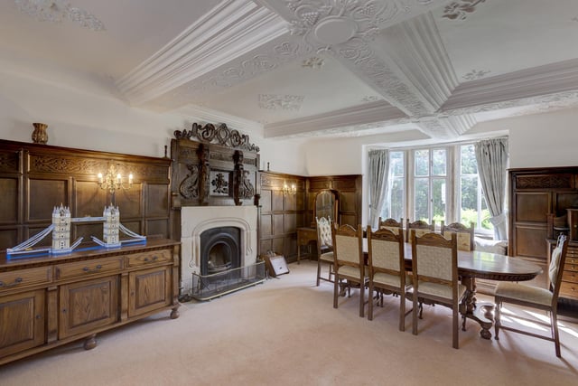 The formal dining room is large and spacious, with lots of personality with it's decorative carvings and mouldings.