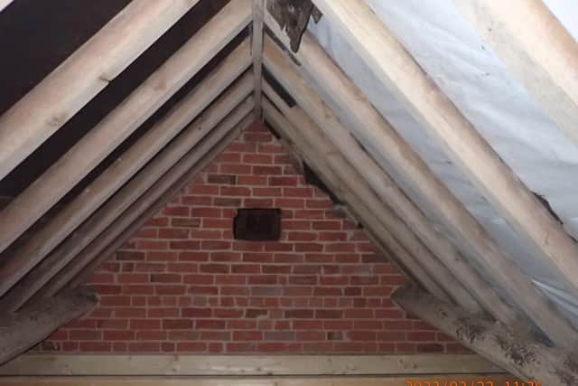 Internal view of one of the buildings within the development, which contains the Brown long-eared bat maternity roost. The white non-breathable roofing membrane was used in breach of the licence as it poses a significant risk of entangling roosting bats, leading to death or serious injury. Credit: Natural England