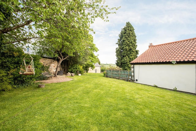 the large landscaped garden provides you with an expansive space for relaxing which has been well maintained and includes a gravelled seating area with views of the countryside