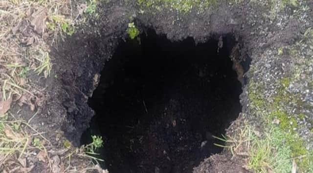 The hole appeared near the junction of Valley Road and Meadow Road in Holmgate.