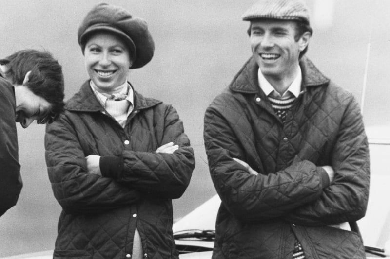 Princess Anne and her husband at the time British equestrian Captain Mark Phillips, both wearing quilted jackets as they attend the Chatsworth Horse Trials, held in the grounds of Chatsworth House in October 1977. Anne was pregnant with her first child. (Photo by Gary Weaser/Keystone/Hulton Archive/Getty Images)