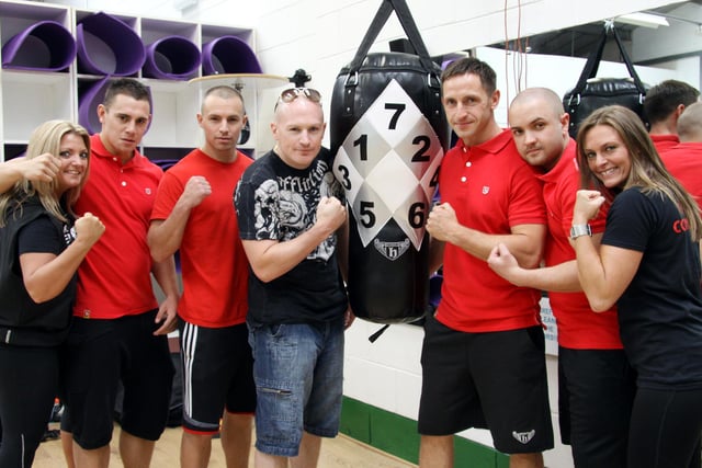 Matthew Hatton, brother of Ricky Hatton, meets New Bodies Gym staff Emma Cartledge, Dean Buxton, Shaun Doxey, Andy Lomax, Ian Hancox and Kelly Scott as he makes a guest appearence at their Family Fun Day in 2011