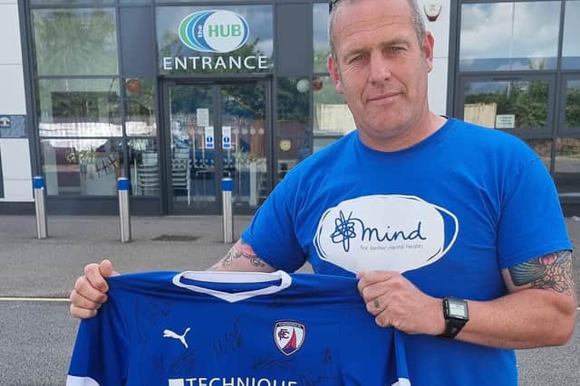 Adam Croser pictured with the signed Chesterfield FC shirt he hopes to give away to a young Spirite.