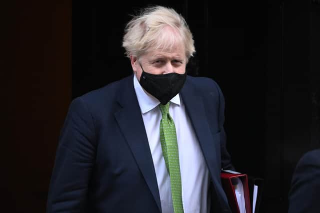 Prime Minister Boris Johnson leaves 10 Downing Street on January 19 (Photo by Leon Neal/Getty Images)