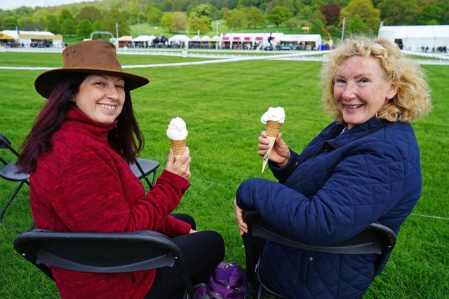 Jayne Griffin and Dawn Barritt enjoy an ice cream while watching the dressage.