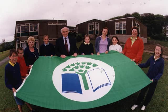 Shirley Niblock, second from right, was deputy head at Hady Primary School in 2002 when this picture was taken of the Eco School green flag. The photo shows pupils Chris Fielding, Michael Reed, Eleanor Watson, Claire Storer, Abby Turner and Kirsty Cooper with eco schools co-ordinator Judith Sensecall, Derbyshire county councillor Walter Burrows and eco schools officer Helen Muir.