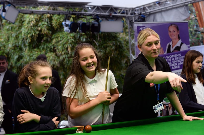 Snooker Womens Day at Sheffield Winter Garden. Pictured is Ladies World ranked No 3 Rebecca Kenna giving instuction to pupils from Spire Junior School.