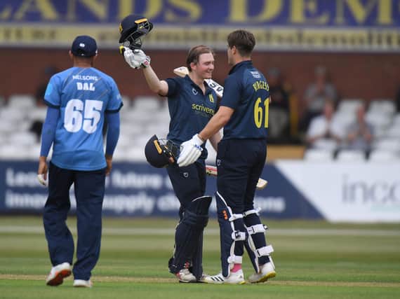 Ed Pollock and Michael Burgess celebrate Warwickshire's win over Derbyshire in the Royal London Cup. (Photo by Tony Marshall/Getty Images)