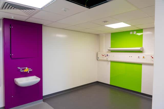 The building is full of bright colours picked by children and parents at the Chesterfield inpatient ward, with each area having a different palette – including hot pink and turquoise blue walls as well as purple doors.