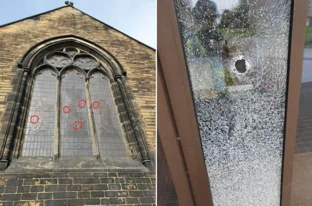 Holes in windows at Staveley Methodist Church (right) and St John the Baptist Church (left). Picture: Derbyshire Constabulary.